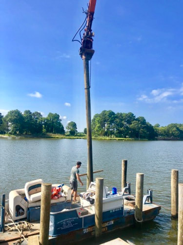 Driving boat Lift Pole in Ocean City, MD